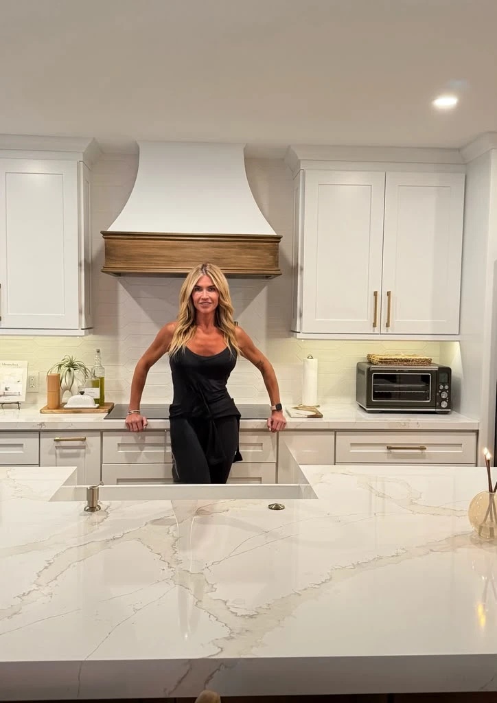 Fiona Rooney standing at a white kitchen island