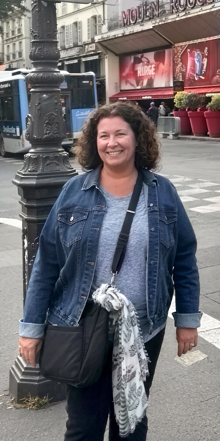 Before, on a city street in a denim jacket